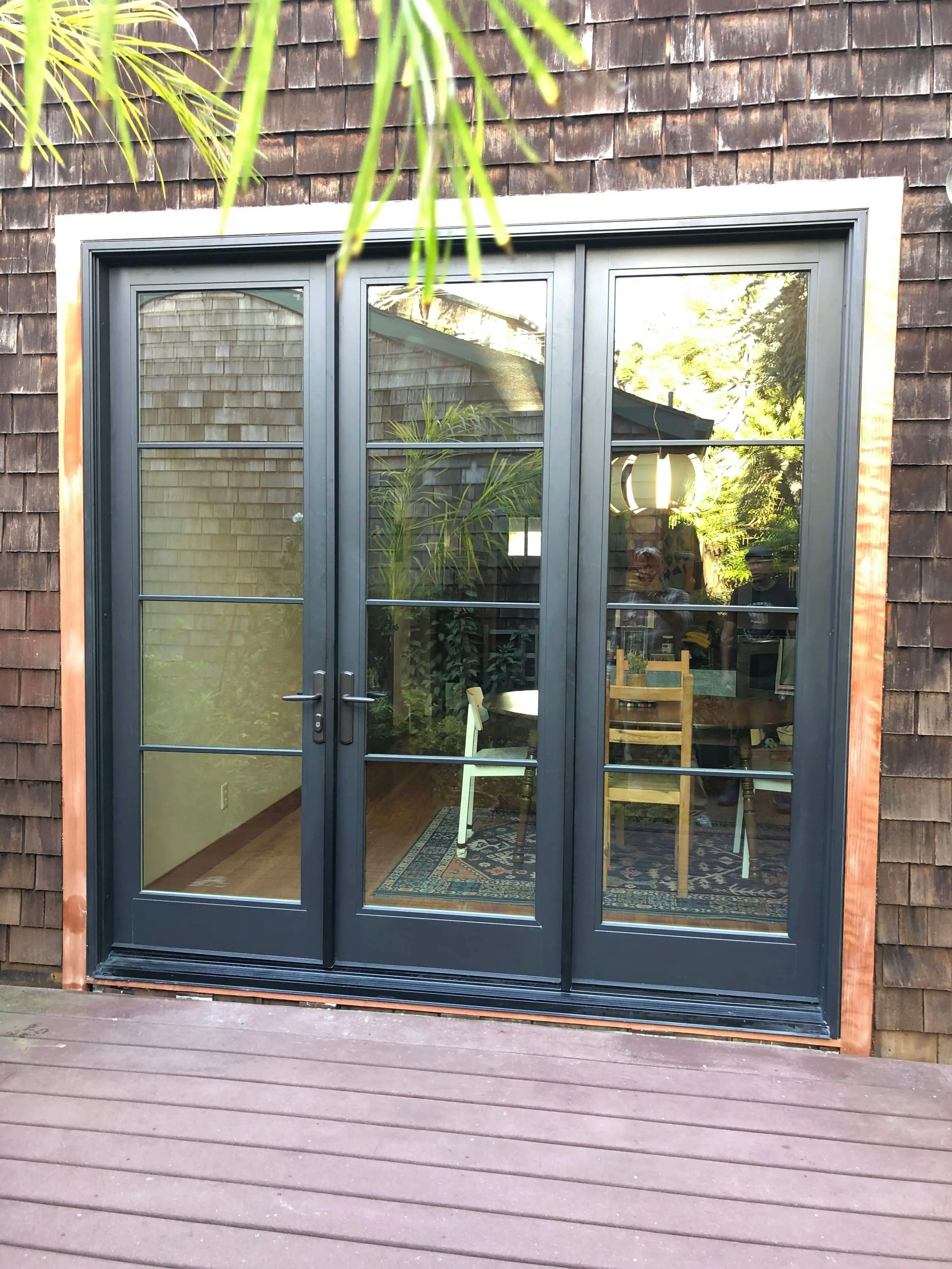 Door new construction installation, exterior finish redwood
